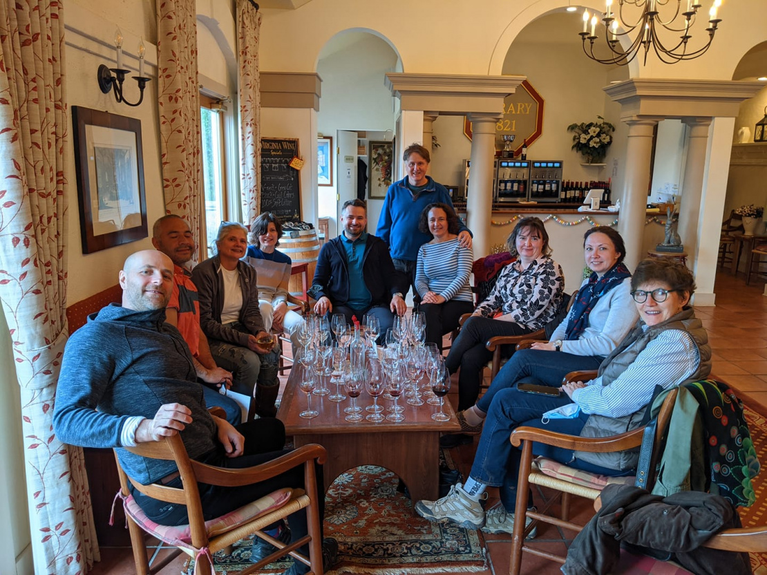 Adult participants and parents enjoy wine at the historic Barboursville vineyard.