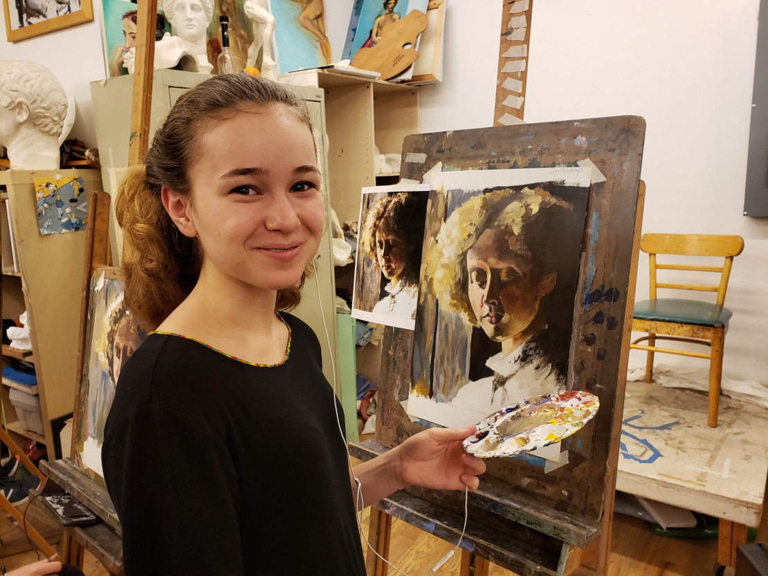 Sophia painting a portrait in oils. 